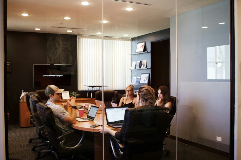 people during an office meeting